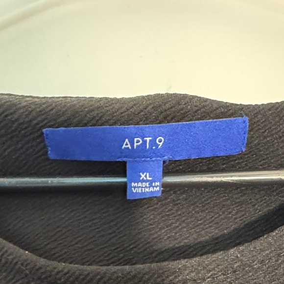 Black Sleeveless Dress with White Dotted Hem and Pockets - Picture 2 of 3